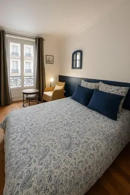 Un ou plusieurs lits dans un hébergement de l'établissement Tour Effeil - Bois de Boulogne