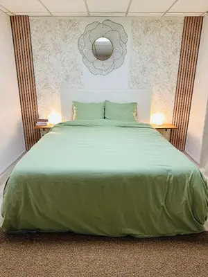 Un ou plusieurs lits dans un hébergement de l'établissement Cosy duplex à Issy-les-Moulineaux