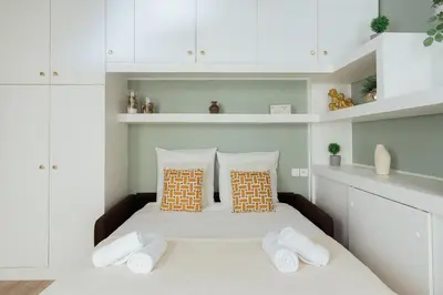 Un ou plusieurs lits dans un hébergement de l'établissement Lumineux et Rayonnant appartement