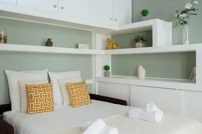 Un ou plusieurs lits dans un hébergement de l'établissement Lumineux et Rayonnant appartement
