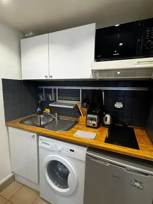 Cuisine ou kitchenette dans l'établissement Appartement lumineux au cœur de Montmartre