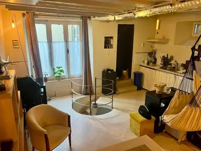 Coin salon dans l'établissement Charming location in Saint-Germain-des-Prés