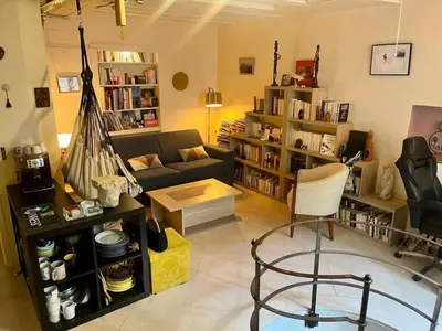 Coin salon dans l'établissement Charming location in Saint-Germain-des-Prés