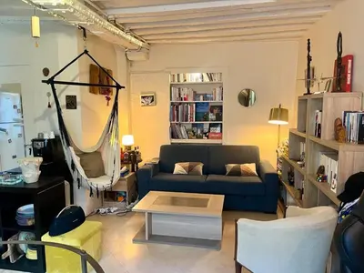 Coin salon dans l'établissement Charming location in Saint-Germain-des-Prés