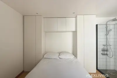 Un ou plusieurs lits dans un hébergement de l'établissement Sunny 1-Bed in Paris Marais District