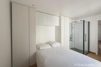 Un ou plusieurs lits dans un hébergement de l'établissement Sunny 1-Bed in Paris Marais District