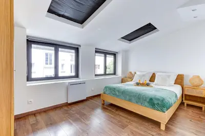 Un ou plusieurs lits dans un hébergement de l'établissement TBS 194 - Elegant apartment in Paris