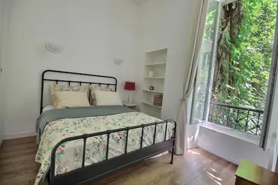 Un ou plusieurs lits dans un hébergement de l'établissement Artist apartment in Le Marais