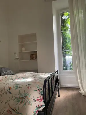 Un ou plusieurs lits dans un hébergement de l'établissement Artist apartment in Le Marais