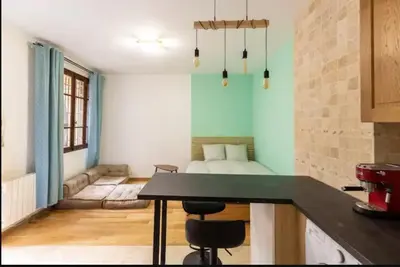 Cuisine ou kitchenette dans l'établissement Montholon1 Charming Apt LaFayette and Opera