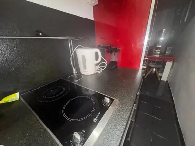 Cuisine ou kitchenette dans l'établissement mon petit Gaité