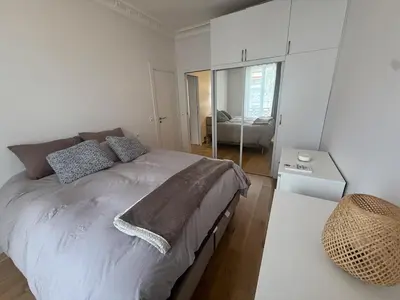 Un ou plusieurs lits dans un hébergement de l'établissement Evasion chic au cœur de Paris