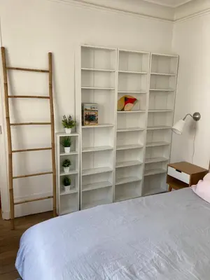 Un ou plusieurs lits dans un hébergement de l'établissement Beau 3 pièces lumineux à 5 min de Montmartre