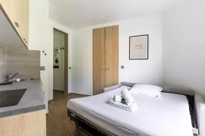 Un ou plusieurs lits dans un hébergement de l'établissement HSH Bessières-Batignolles Paris Superbe Studio