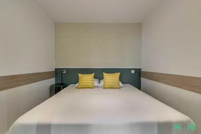 Un ou plusieurs lits dans un hébergement de l'établissement Appartement cosy pour 4 pers. – Parc des Expositions Porte de Versailles