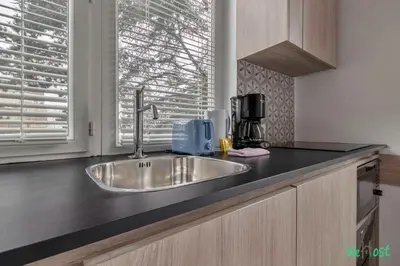 Cuisine ou kitchenette dans l'établissement Louis Vicat 3 - CI - Cosy flat for 2 Near Parc Expo Porte de versailles