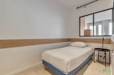 Un ou plusieurs lits dans un hébergement de l'établissement Apt cosy pour 6 - Paris Expo P. de Versailles