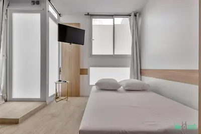 Un ou plusieurs lits dans un hébergement de l'établissement Apt cosy pour 6 - Paris Expo P. de Versailles