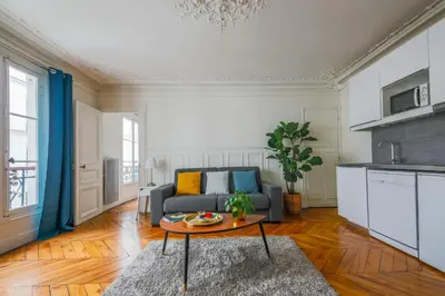 Cuisine ou kitchenette dans l'établissement Appartements Bergère