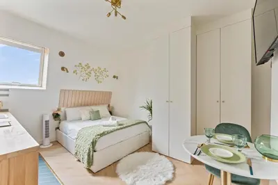 Un ou plusieurs lits dans un hébergement de l'établissement Beautiful Studio Metro and Paris at Your Door