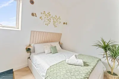 Un ou plusieurs lits dans un hébergement de l'établissement Beautiful Studio Metro and Paris at Your Door