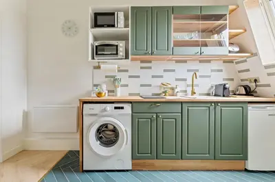 Cuisine ou kitchenette dans l'établissement Beautiful Studio Metro and Paris at Your Door
