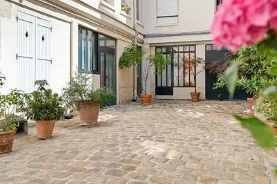 Jardin de l'établissement Le Marais - Prestige apartment for 3
