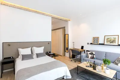 Un ou plusieurs lits dans un hébergement de l'établissement A3 Suite Studio 175Blo-Paris Convention