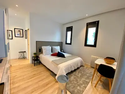 Un ou plusieurs lits dans un hébergement de l'établissement B7 Studio 175Blo-Paris Convention