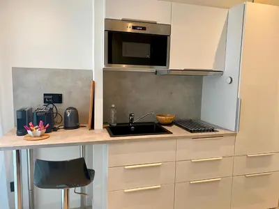 Cuisine ou kitchenette dans l'établissement B7 Studio 175Blo-Paris Convention