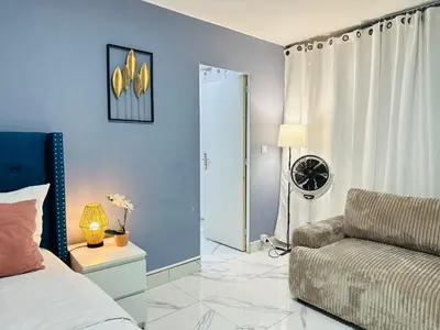 Un ou plusieurs lits dans un hébergement de l'établissement Holiday Apartment 01