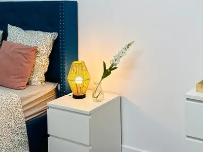 Un ou plusieurs lits dans un hébergement de l'établissement Holiday Apartment 01