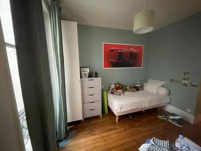 Un ou plusieurs lits dans un hébergement de l'établissement Elegant Haussmann apartment - Champs-Élysées