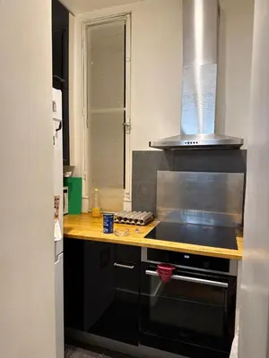 Cuisine ou kitchenette dans l'établissement Elegant Haussmann apartment - Champs-Élysées