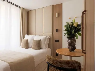 Un ou plusieurs lits dans un hébergement de l'établissement Elegant Studio 2P Montorgueil Grands Boulevards