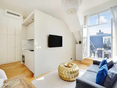 Télévision ou salle de divertissement dans l'établissement Magnificent apartment -1BR-4P- Champs-Élysées