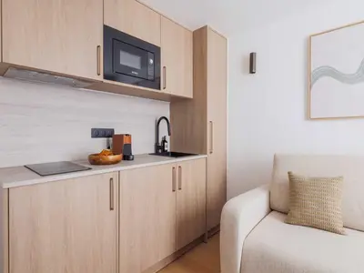 Cuisine ou kitchenette dans l'établissement Chic and cosy apartment - 1BR- 4P- Bourse