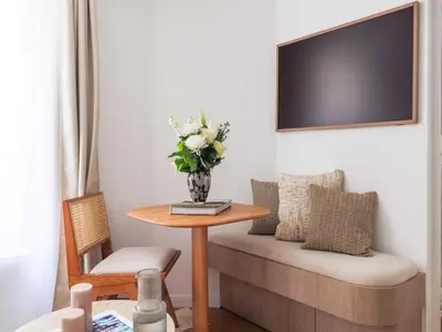 Coin salon dans l'établissement Chic and cosy apartment - 1BR- 4P- Bourse