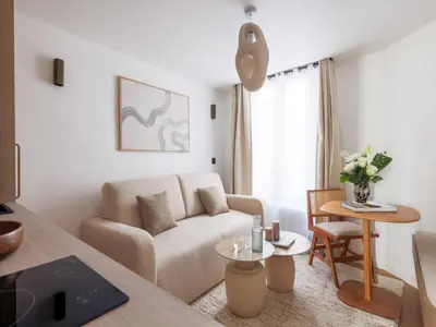 Coin salon dans l'établissement Chic and cosy apartment - 1BR- 4P- Bourse