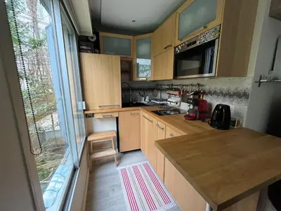 Cuisine ou kitchenette dans l'établissement Havre de paix près de Roland Garros