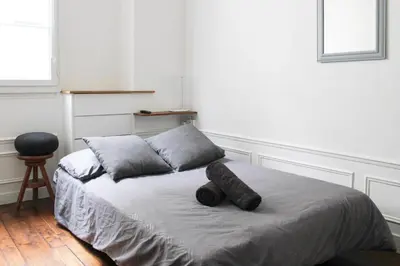 Un ou plusieurs lits dans un hébergement de l'établissement Nice studio with Wifi near Montparnasse