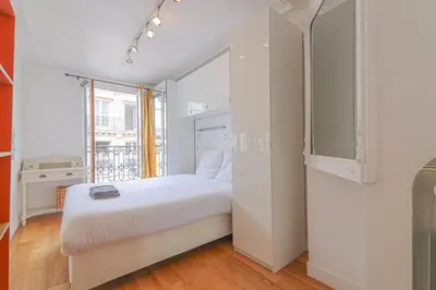 Un ou plusieurs lits dans un hébergement de l'établissement 1BR Apartment - 4P - Tour Eiffel with NetFlix