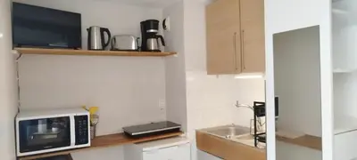 Cuisine ou kitchenette dans l'établissement Studio 2 Guests Gare de Lyon Bastille