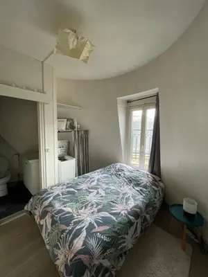 Un ou plusieurs lits dans un hébergement de l'établissement Eiffel Apartment