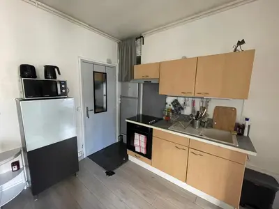 Cuisine ou kitchenette dans l'établissement Eiffel Apartment