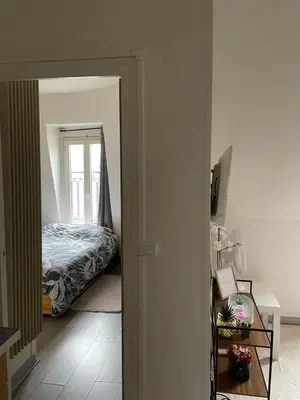 Un ou plusieurs lits dans un hébergement de l'établissement Eiffel Apartment