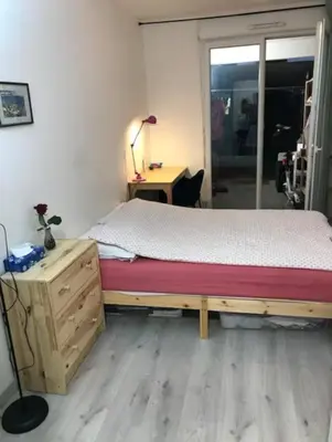 Un ou plusieurs lits dans un hébergement de l'établissement Petit Jardin de Paris