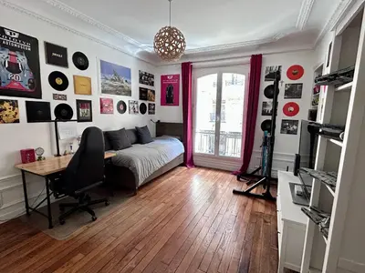 Coin salon dans l'établissement Superbe 120m2 17ème - 6p