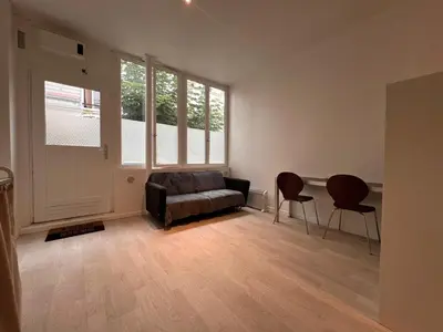 Coin salon dans l'établissement Studio lumineux sur cour à Bastille