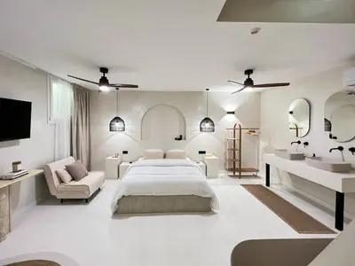Un ou plusieurs lits dans un hébergement de l'établissement Stylish Souplex - near Palais Royal-Louvre Museum